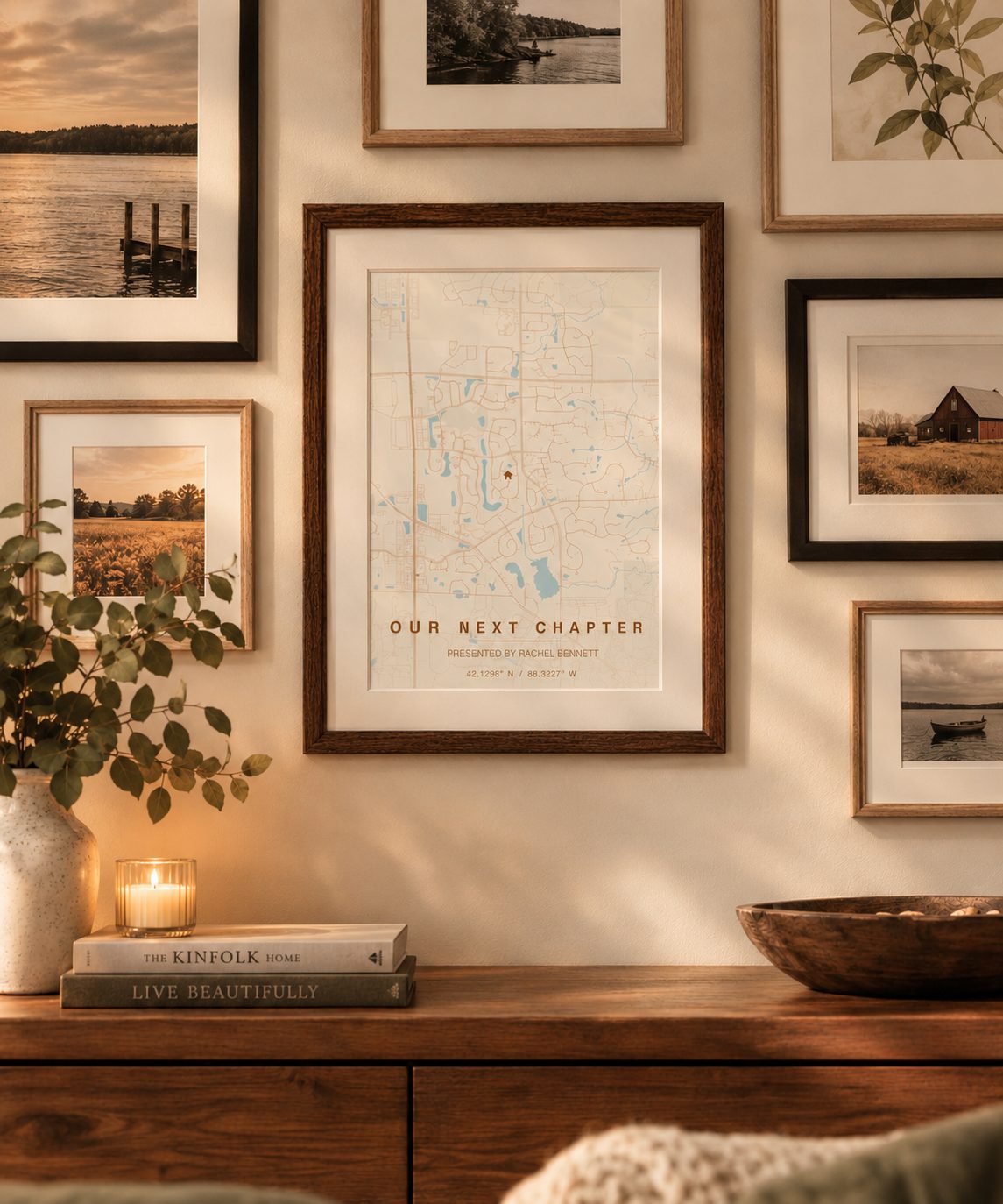 An LJ Map Co print titled "Our Next Chapter," presented by Rachel Bennett, hanging as part of a real gallery wall among personal photos